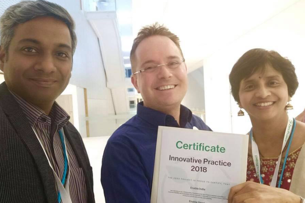 Shanti Raghavan, Julian Tarbox and Top Official of Onion Dev with the certificate of award