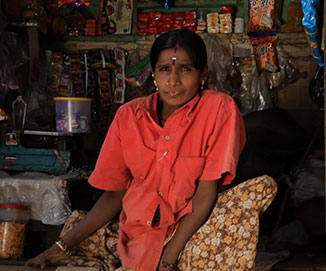Woman with physical disability in kirana shop
